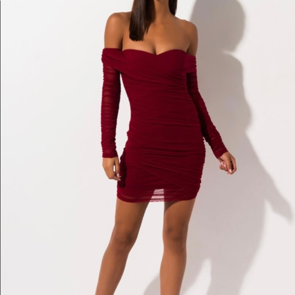 Akira rouched off the shoulder dress. Maroon color size medium